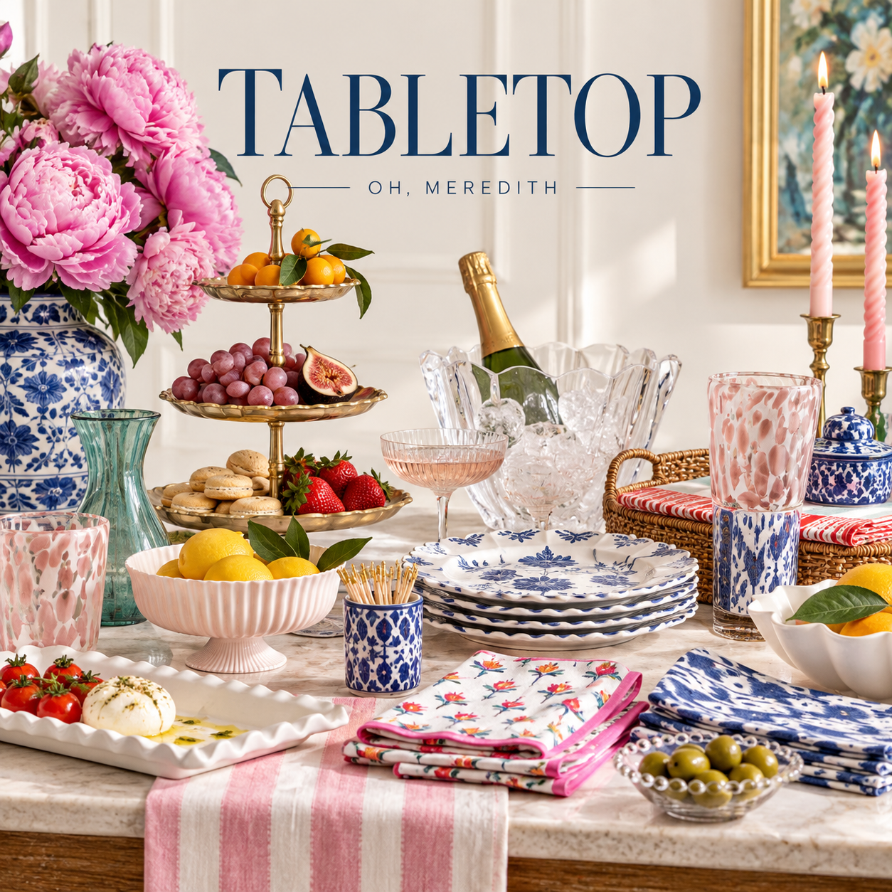 Oh, Meredith Tabletop collection graphic featuring a styled entertaining scene with floral plates, serving pieces, glassware, napkins, fruit, flowers, and chic tabletop accents.