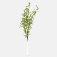 Artificial green plant branch on a white background