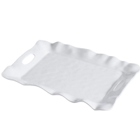 White wavy ceramic plate on a white background