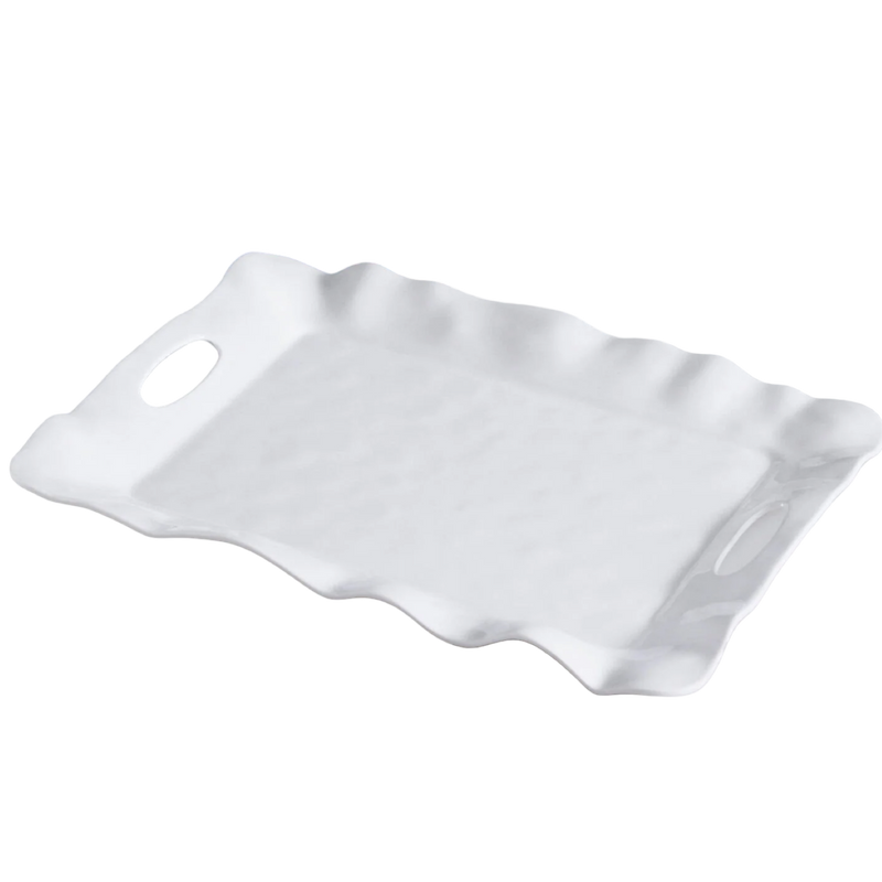 White wavy ceramic plate on a white background