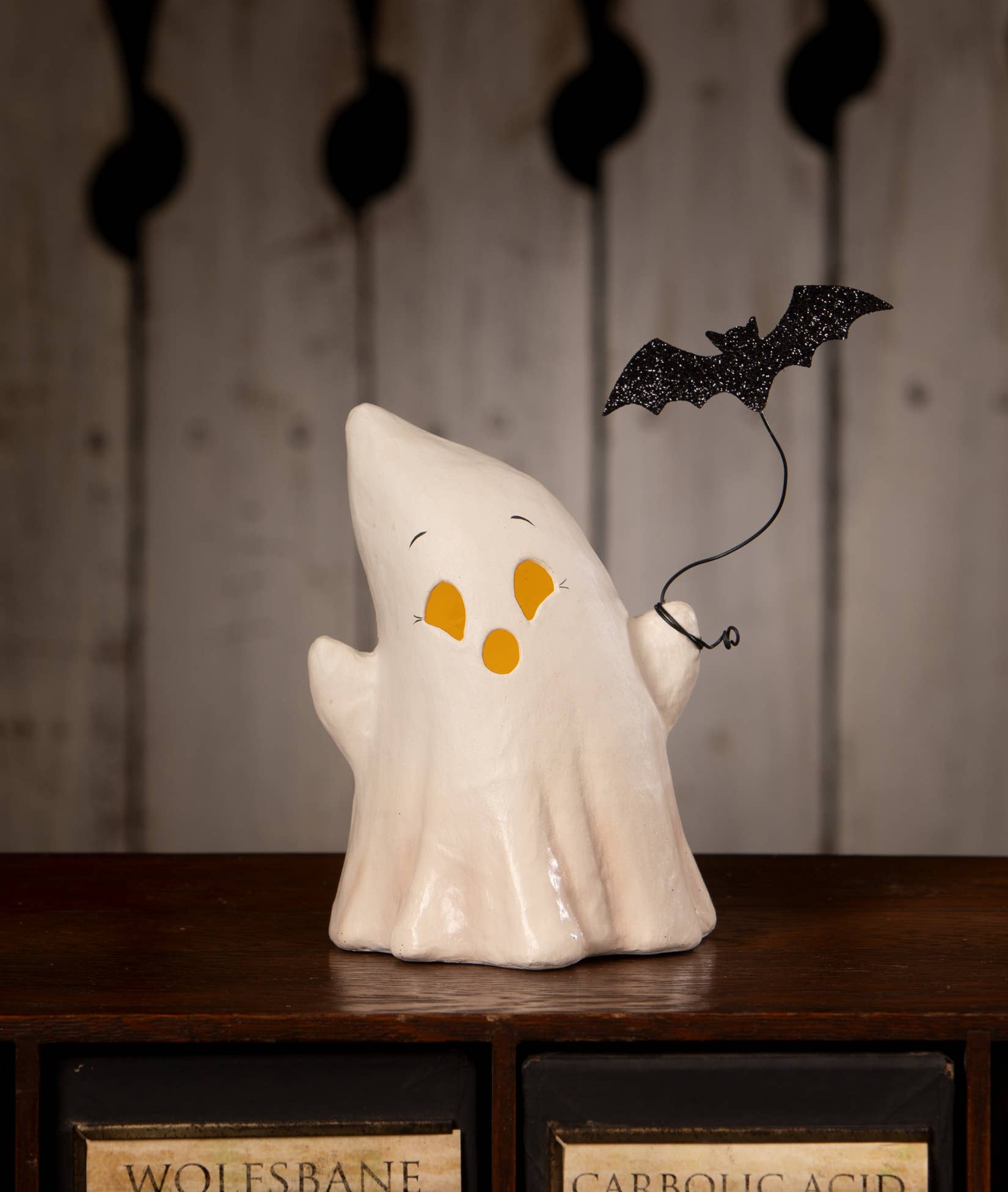 Bethany Lowe Designs Luminary Boo with Bat paper mache Halloween ghost featuring cutout face and suspended glittered black bat.