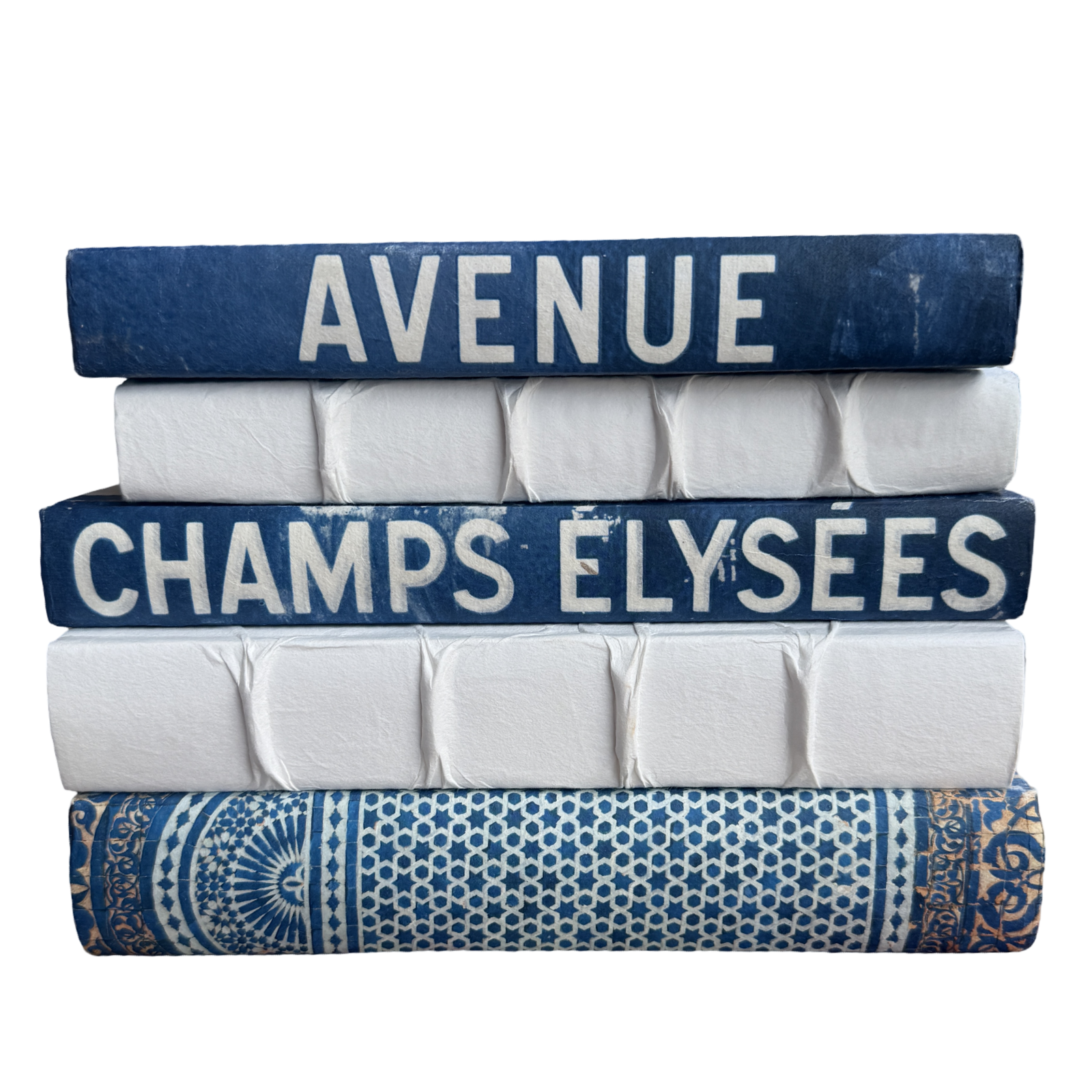 Stack of books with decorative covers on a white background