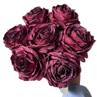 Burgundy vintage-style faux rose bouquet with seven full layered rose stems and leaves