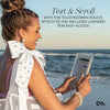 Woman on beach using a touchscreen pouch with text overlay