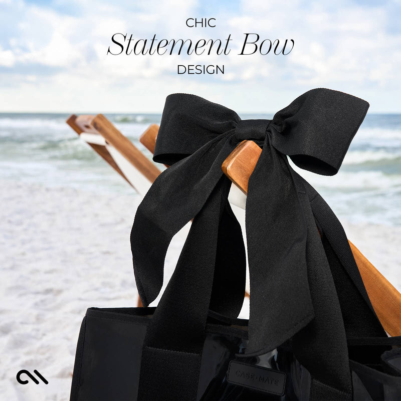 Black statement bow on a chair with a beach background