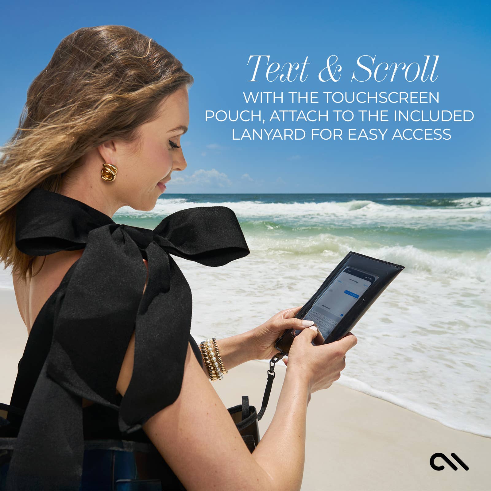 Woman using a touchscreen pouch on the beach with text overlay.