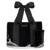 Black tote bag with a large bow and matching pouch on a white background