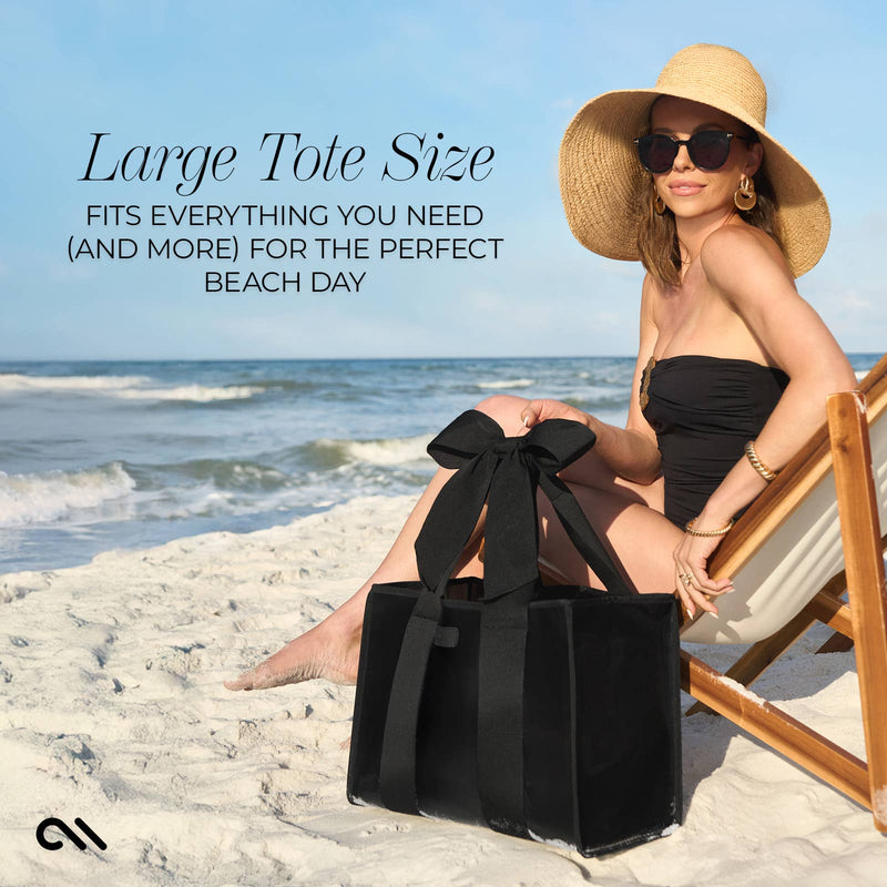Woman on a beach with a large black tote bag, promotional text for a large tote size.
