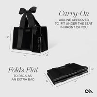 Black travel bag with dimensions and airline approval information on a white background
