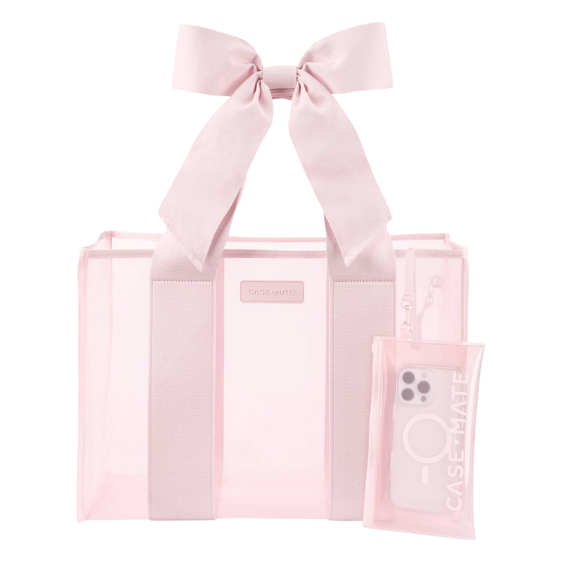 Pink tote bag with a bow and a phone case on a white background