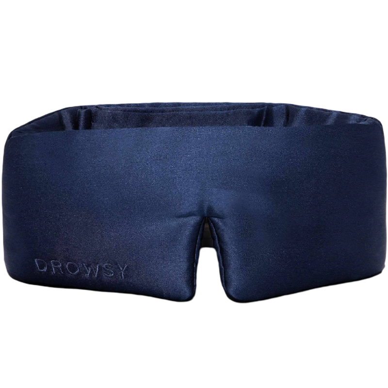 Navy blue sleep mask with 'Drowsy' branding on a white background