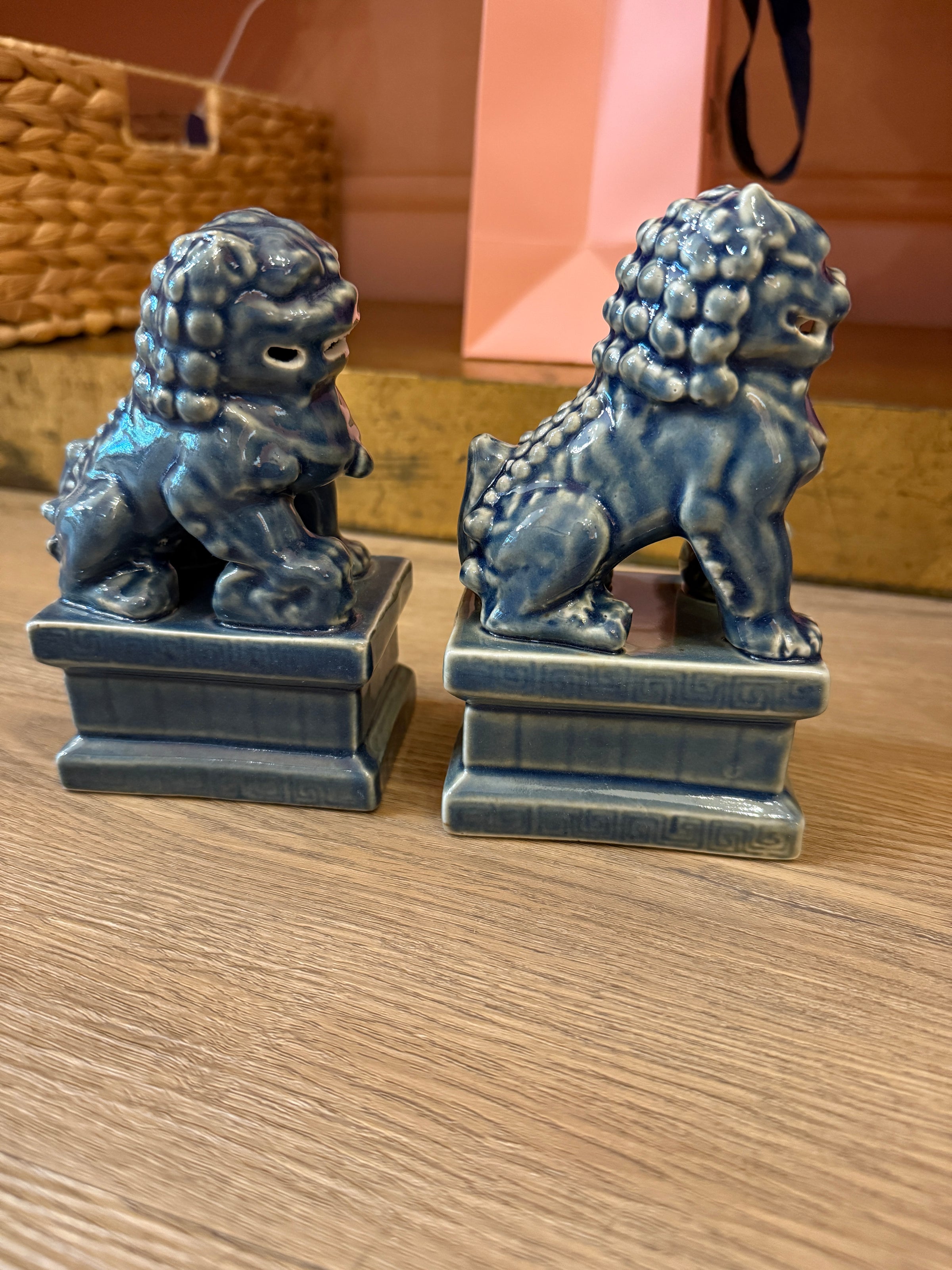 Foo Dogs, porcelain foo dogs, dusty blue foo dogs, blue ceramic foo dogs, Chinese guardian lions, feng shui decor, decorative foo dog pair, glazed porcelain statues, shelf styling accents, blue foo dog figures