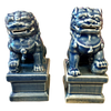 Two blue ceramic lion statues on white background