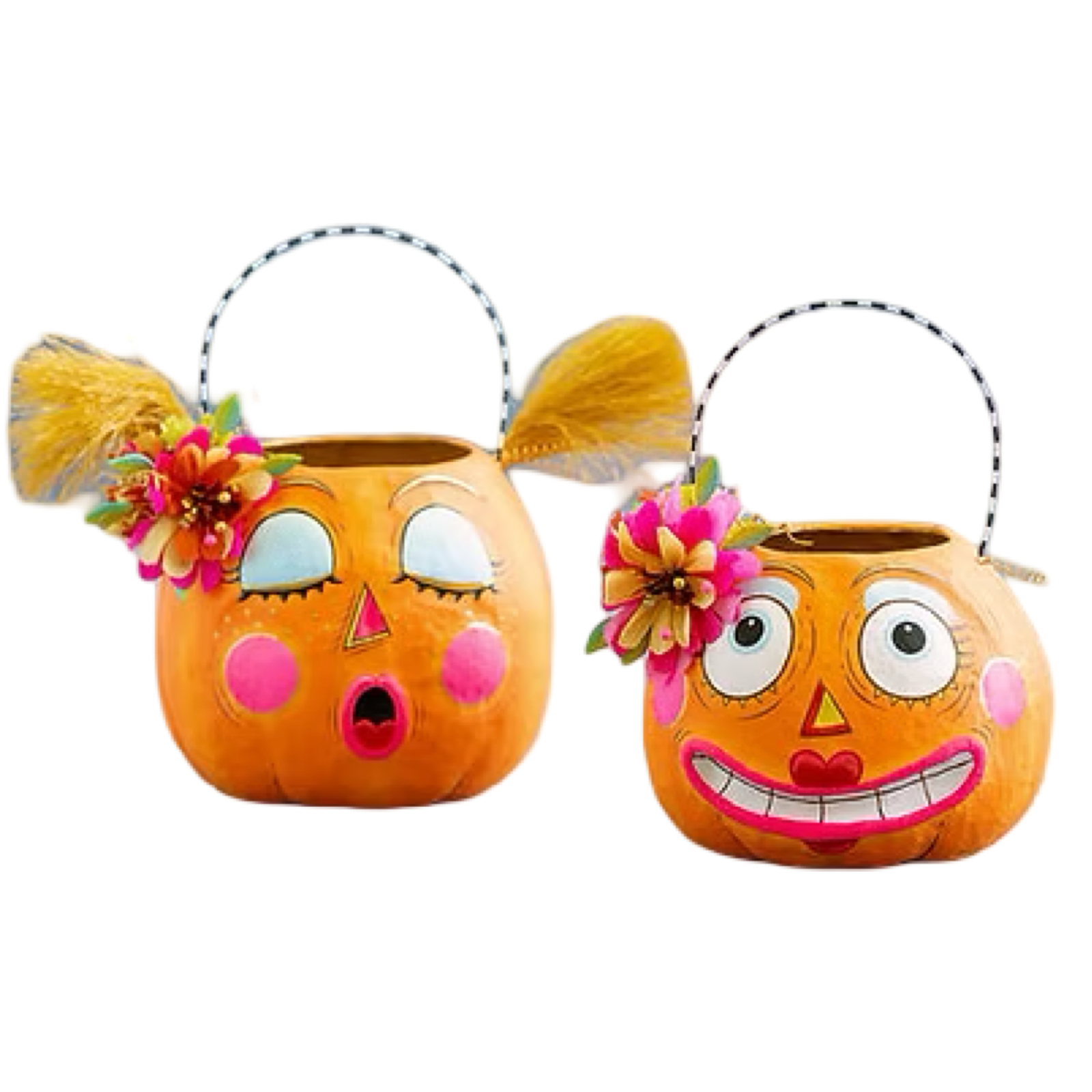 Two orange pumpkin-shaped bucket baskets with decorative faces and floral accents, shown on a plain white background. One has a surprised expression with closed eyes, and the other has a wide smiling expression with open eyes.
