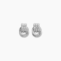 Pair of silver hoop earrings on a white background