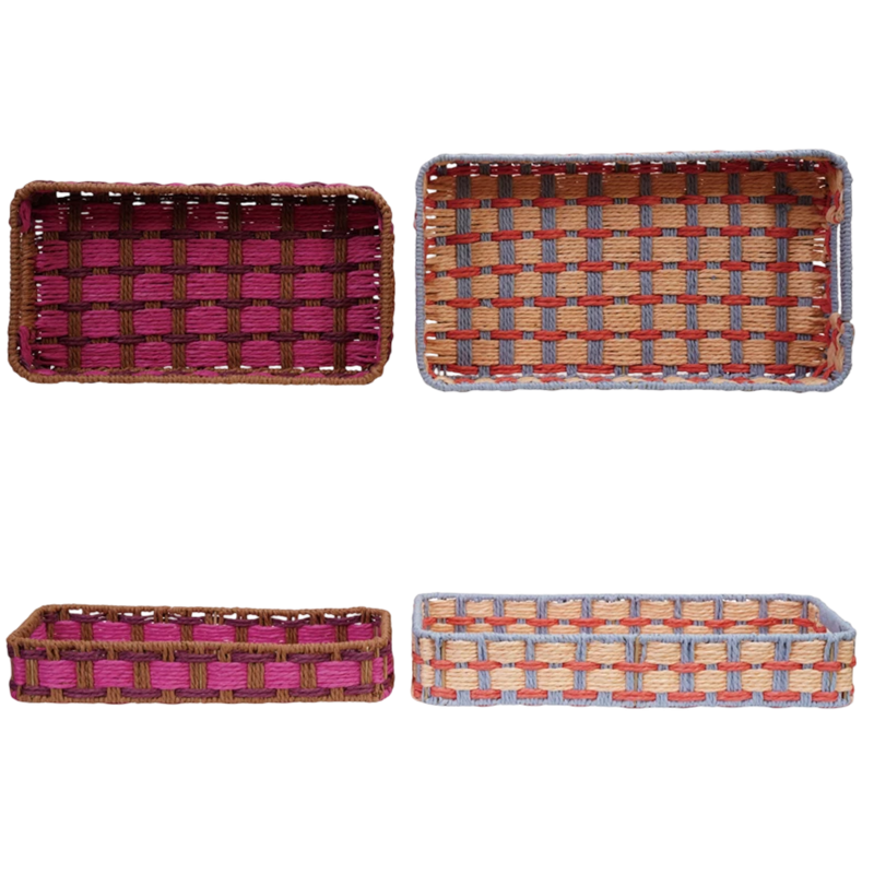 Set of four woven baskets with different color patterns on a white background