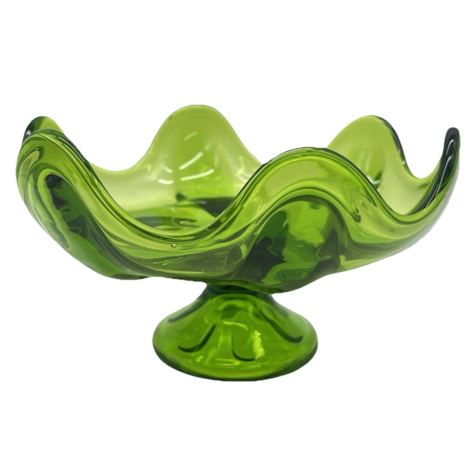 Green glass bowl with wavy design on a white background