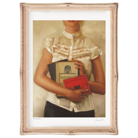 Framed artwork of a person holding books with a red clutch.