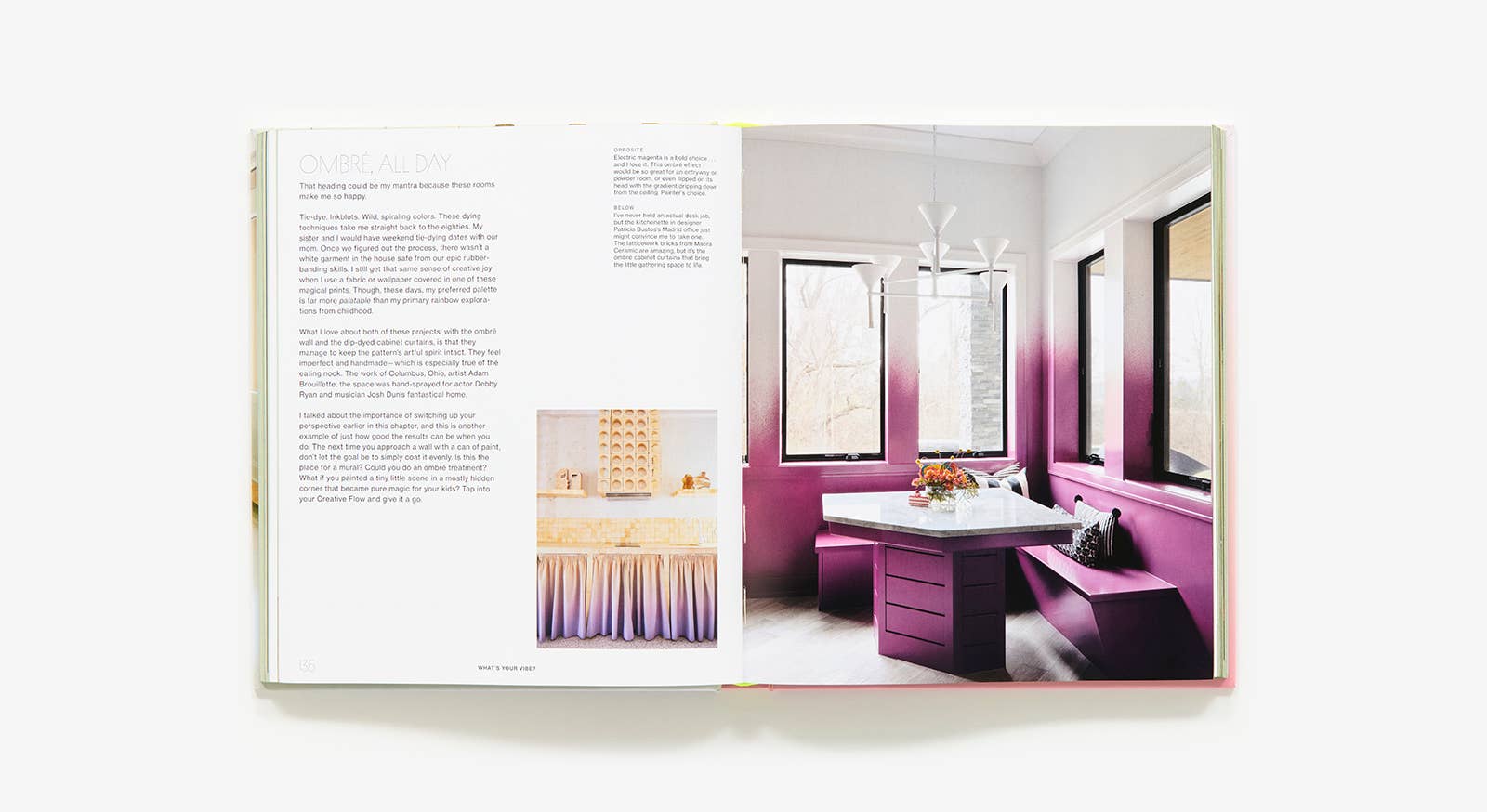 Open book showing a modern interior design with pink and white color scheme.