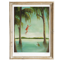 Framed artwork of a woman in a red dress jumping into a lake surrounded by trees.