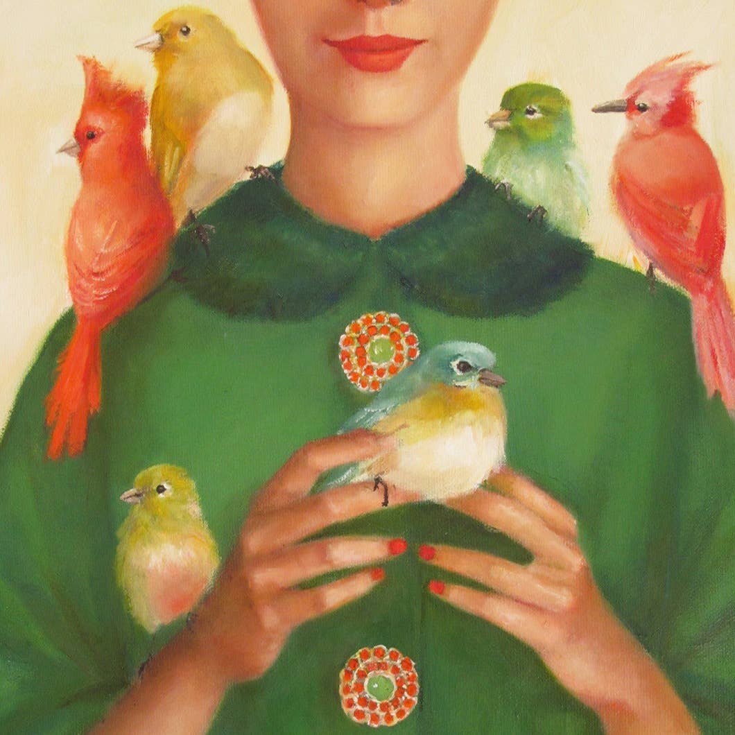 Woman in a green dress with birds on her shoulders and in her hands, wearing a brooch.