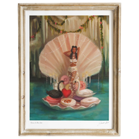 Framed artwork of a woman in a decorative setting with a shell and heart