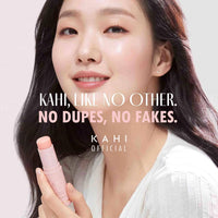 Woman holding a pink lipstick with promotional text on a light background