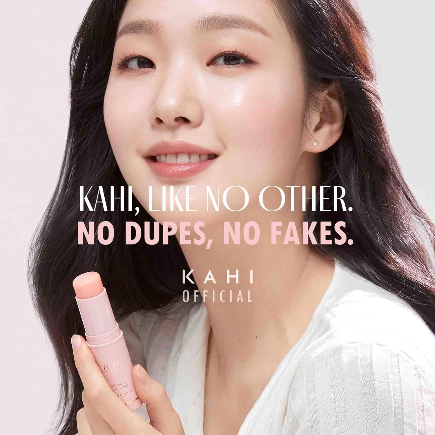 Woman holding a pink lipstick with promotional text on a light background