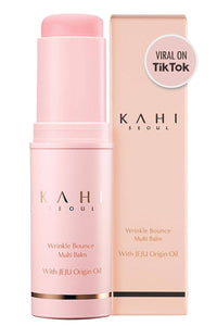 Pink balm with 'Kahi Seoul' branding and a box on a white background.