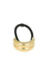 Gold hair tie with three stacked loops on a white background