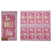 Packaging of 'La Dolce Vita' with pink and white design on a white background