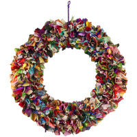 Large multicolor recycled sari fabric wreath handmade in India from colorful reclaimed textile remnants.