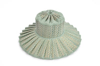 Lorna Murray Fiji hat, foldable sun hat, UPF 50+ hat, woven travel sun hat, Fiji sun hat, packable beach hat, grass fibre hat, summer hat with seafoam trim, stylish sun protection, Lorna Murray travel hat

