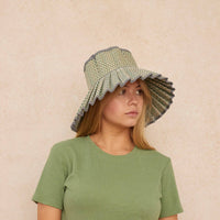 Lorna Murray sun hat, foldable sun hat, UPF 50+ sun protection, Kohama hat, travel-friendly sun hat, woven grass sun hat, stylish beach hat, packable summer hat, wide brim hat, Lorna Murray Kohama