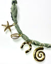 Mandriana bandana necklace, seaside charm necklace, fish and shell necklace, handmade coastal jewelry, beachy boho necklace, lucky talisman necklace, olive green bandana necklace, spiral pendant choker, gold charm necklace, boho beach accessories