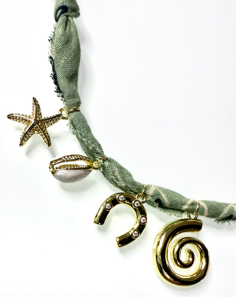Mandriana bandana necklace, seaside charm necklace, fish and shell necklace, handmade coastal jewelry, beachy boho necklace, lucky talisman necklace, olive green bandana necklace, spiral pendant choker, gold charm necklace, boho beach accessories