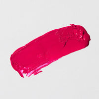 Hollywood Carnation vibrant fuchsia lipstick swatch with cool blue-based undertones