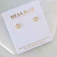 Mesa Blue handcrafted earrings on a white card with gold text