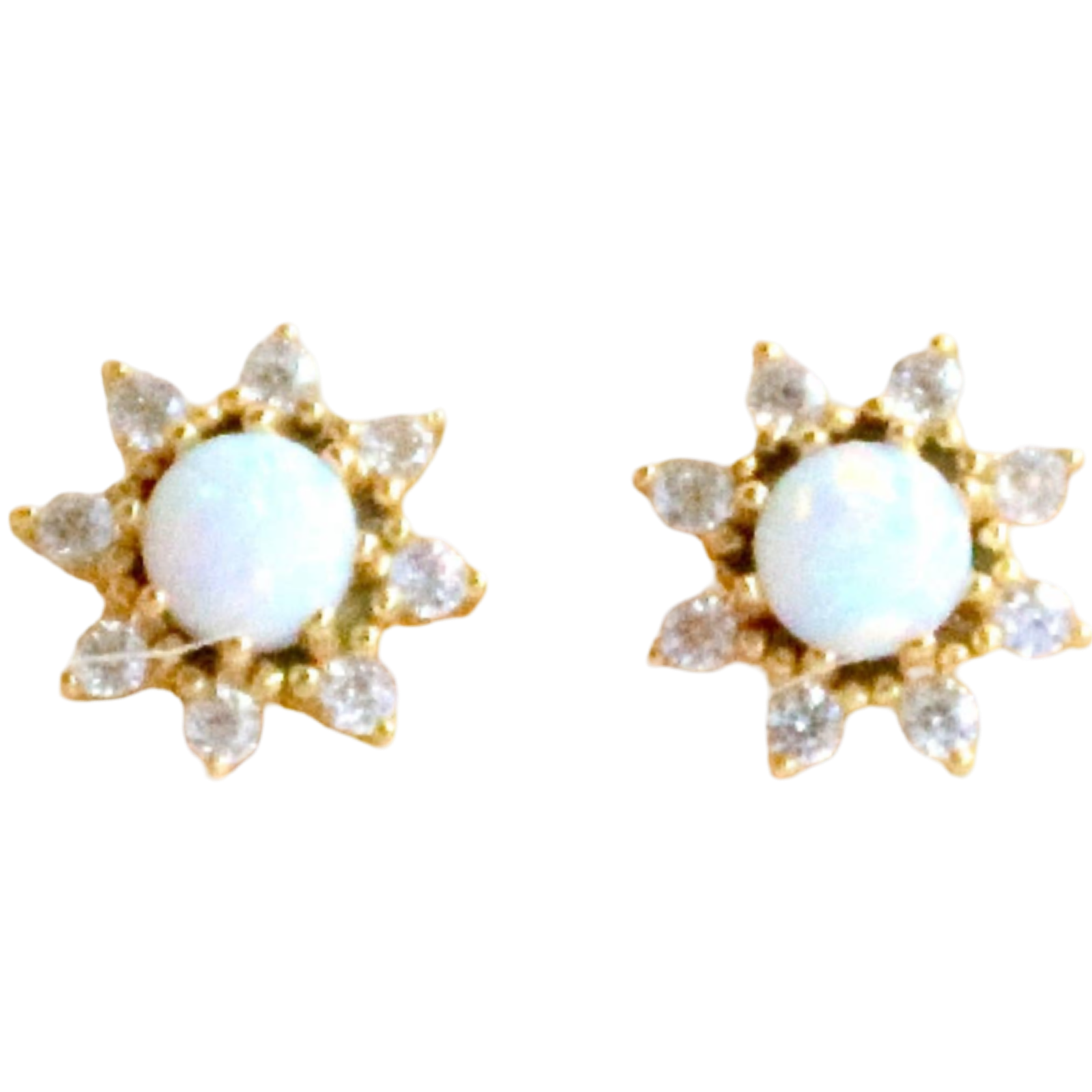 Pair of gold earrings with opal stones on a white background