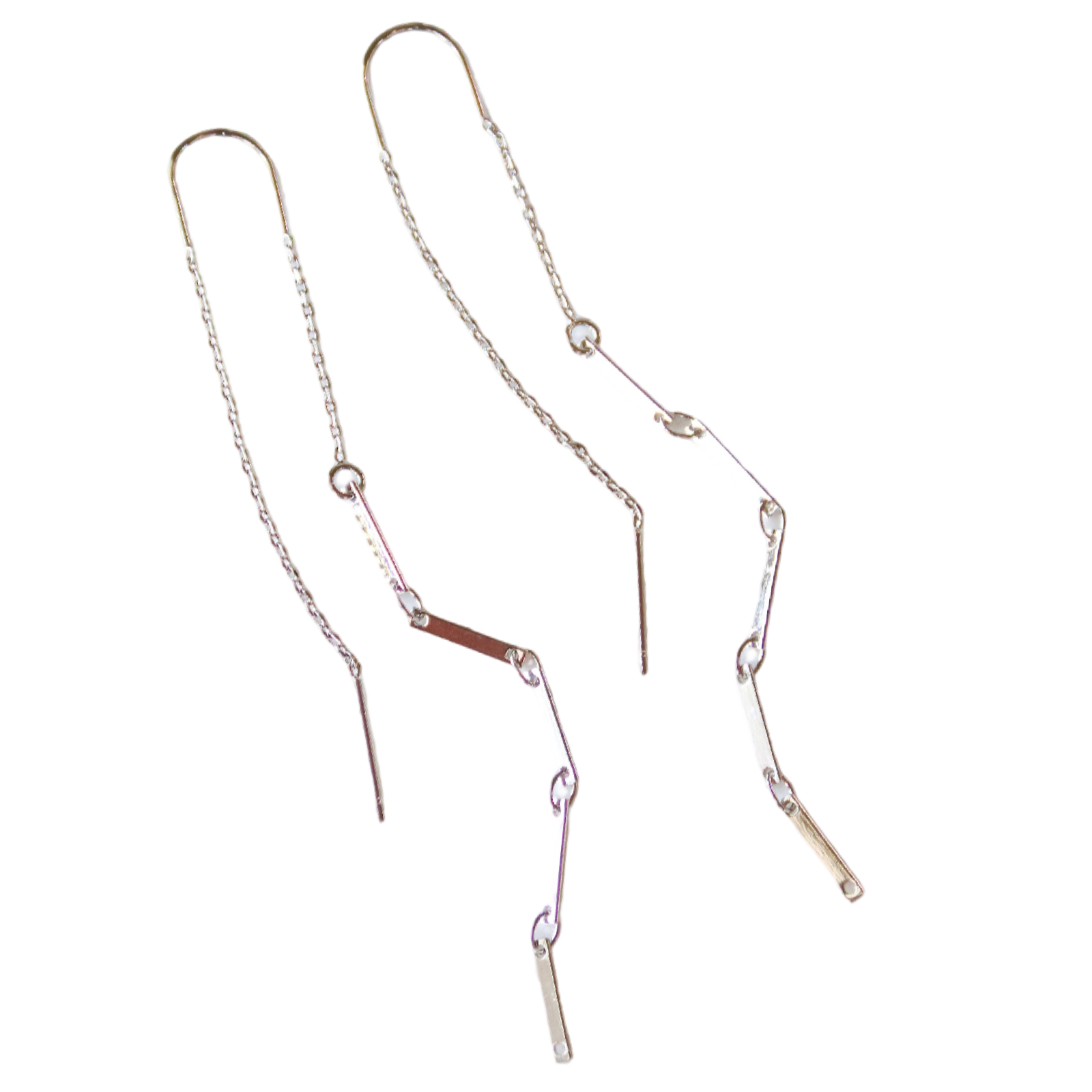 Two gold necklaces on a white background