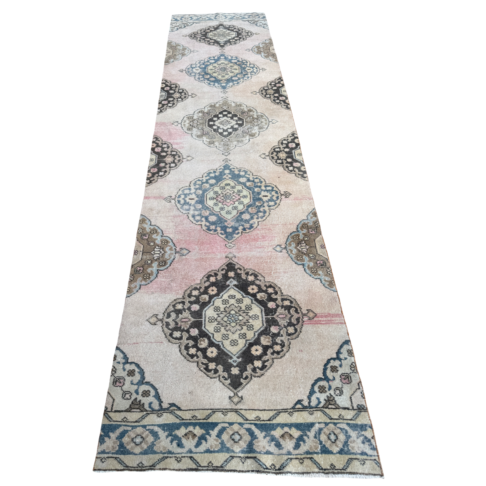One-of-a-kind vintage wool runner rug with faded blush pink, dusty blue, cream and charcoal medallion pattern, approximately 2'11" x 12'3".