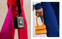 Two handbags, one black with gold accents and one orange, held by people in red and blue outfits.