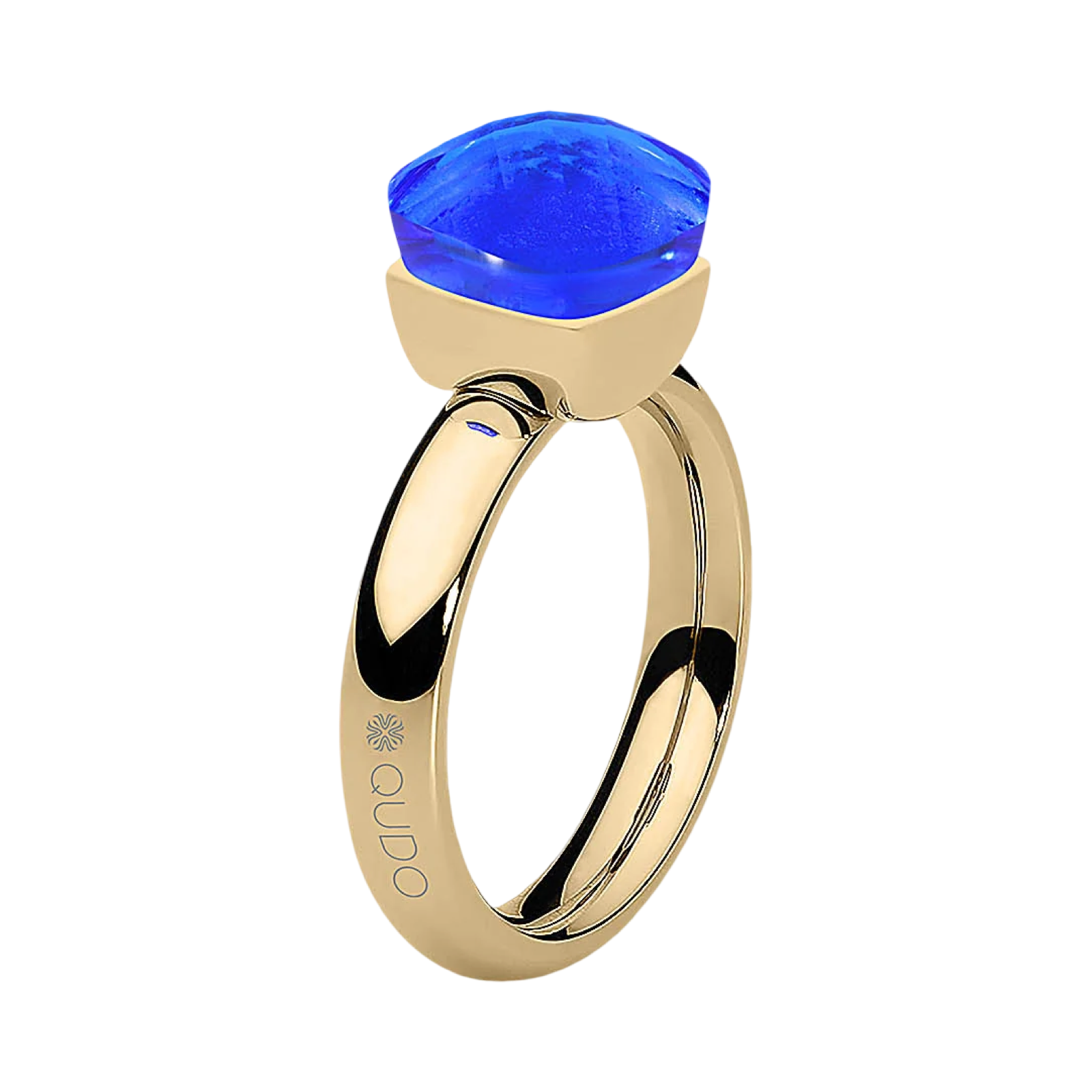 Gold ring with a blue gemstone on a white background