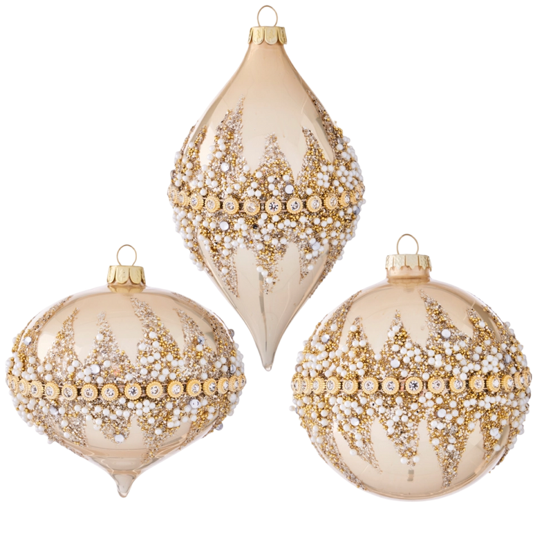 Three decorative Christmas ornaments with gold and pearl patterns on a white background