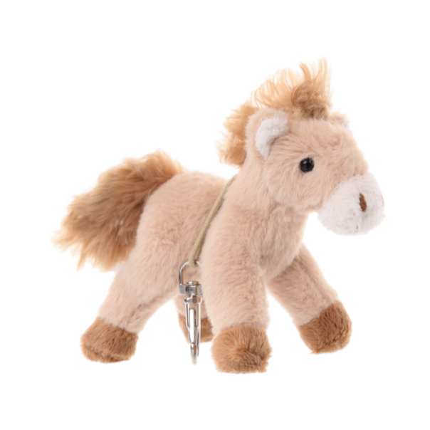 Say hello to Sugar — the sweetest little pony in the Bukowski bunch. This 4-inch plush charm is made in Sweden with a soft cream coat and irresistible fuzzy texture. Clip her onto your bag, keys, or backpack for a touch of playful spirit and equestrian flair wherever you go.