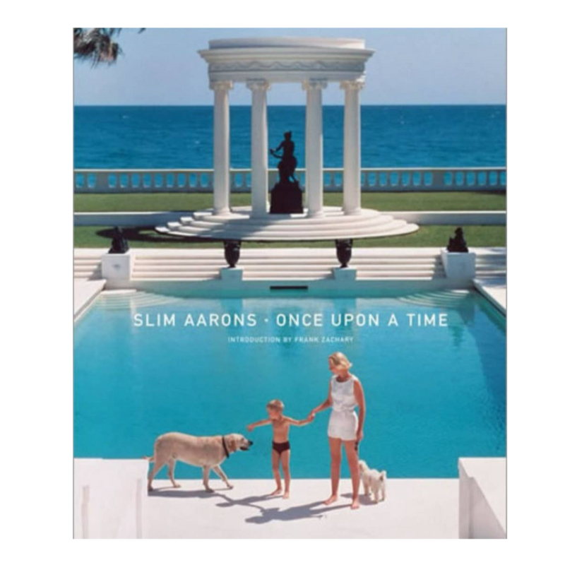 Slim Aarons, luxury photography, high society, elite lifestyles, vintage photography, coffee table book, wealth and privilege, iconic photographer, glamorous lifestyle, mid-century fashion, affluent class, opulent living