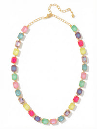 Necklace with colorful beads on a white background