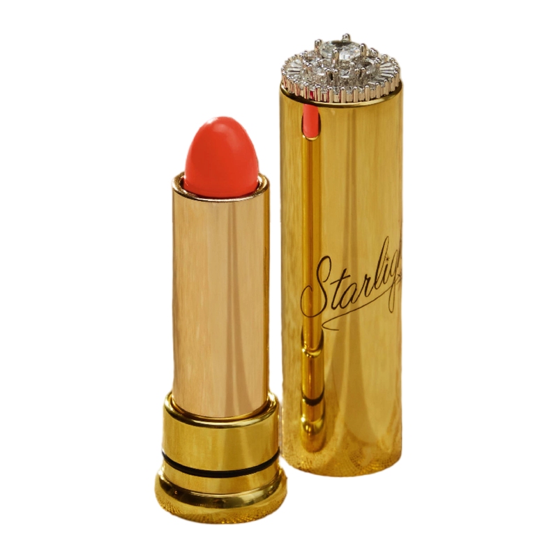 Starlight Vintage Cosmetics Holly’s Peach lipstick in warm peachy-pink shade with vintage-inspired gold metal tube.