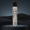 Hairspray can with a black and white label featuring a face design on a dark background