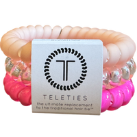 TELETIES hair ties, Aruba Pink Blush hair ties, no-rip hair ties, large spiral hair coils, spiral hair ties, stylish hair accessories, hair ties that double as bracelets, durable hair ties, pink hair ties for thick hair, hair accessories in pink.